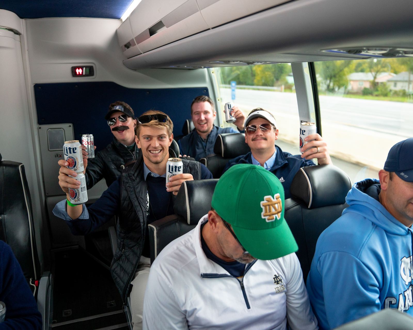 Fans aboard the Irish Express luxury motorcoach